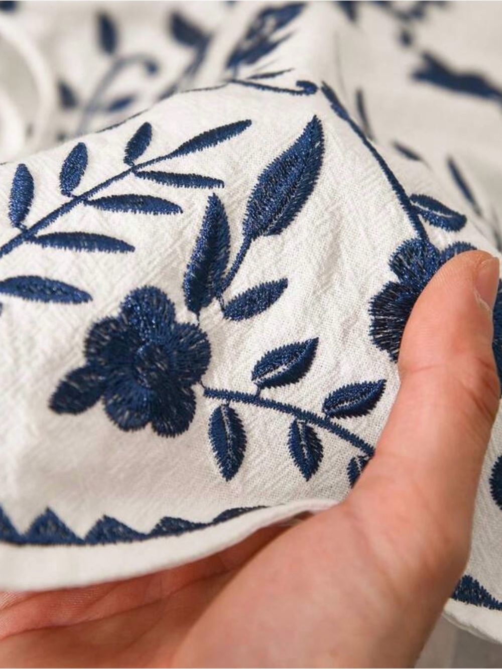 Embroidered White Peasant Tie-Front Top with Navy Floral Details - Picture 3 of 3